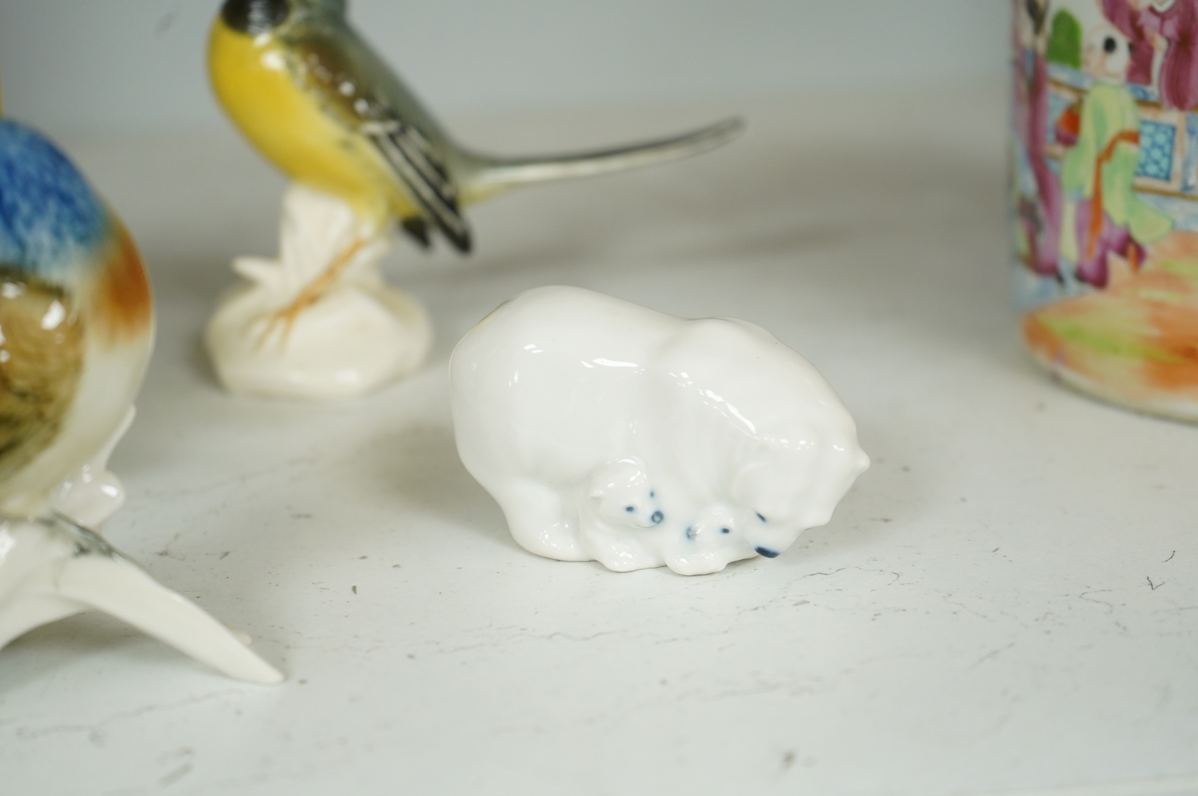 A collection of Copenhagen and other German porcelain birds, tallest 20cm